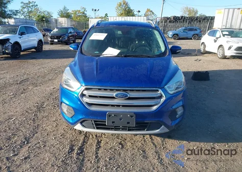 2017 Ford Escape Titanium z USA, uszkodzony, nr VIN 1FMCU9J91HUB57314